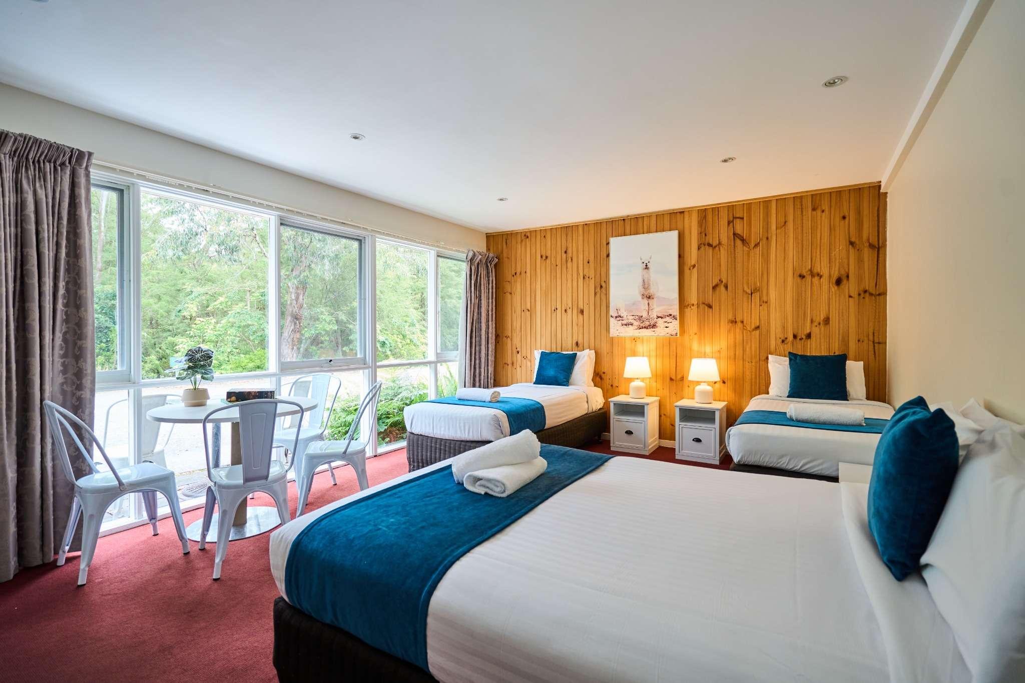 Standard family room with queen and single beds at Sanctuary House Healesville